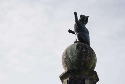 Obelisk with Ball and Cat