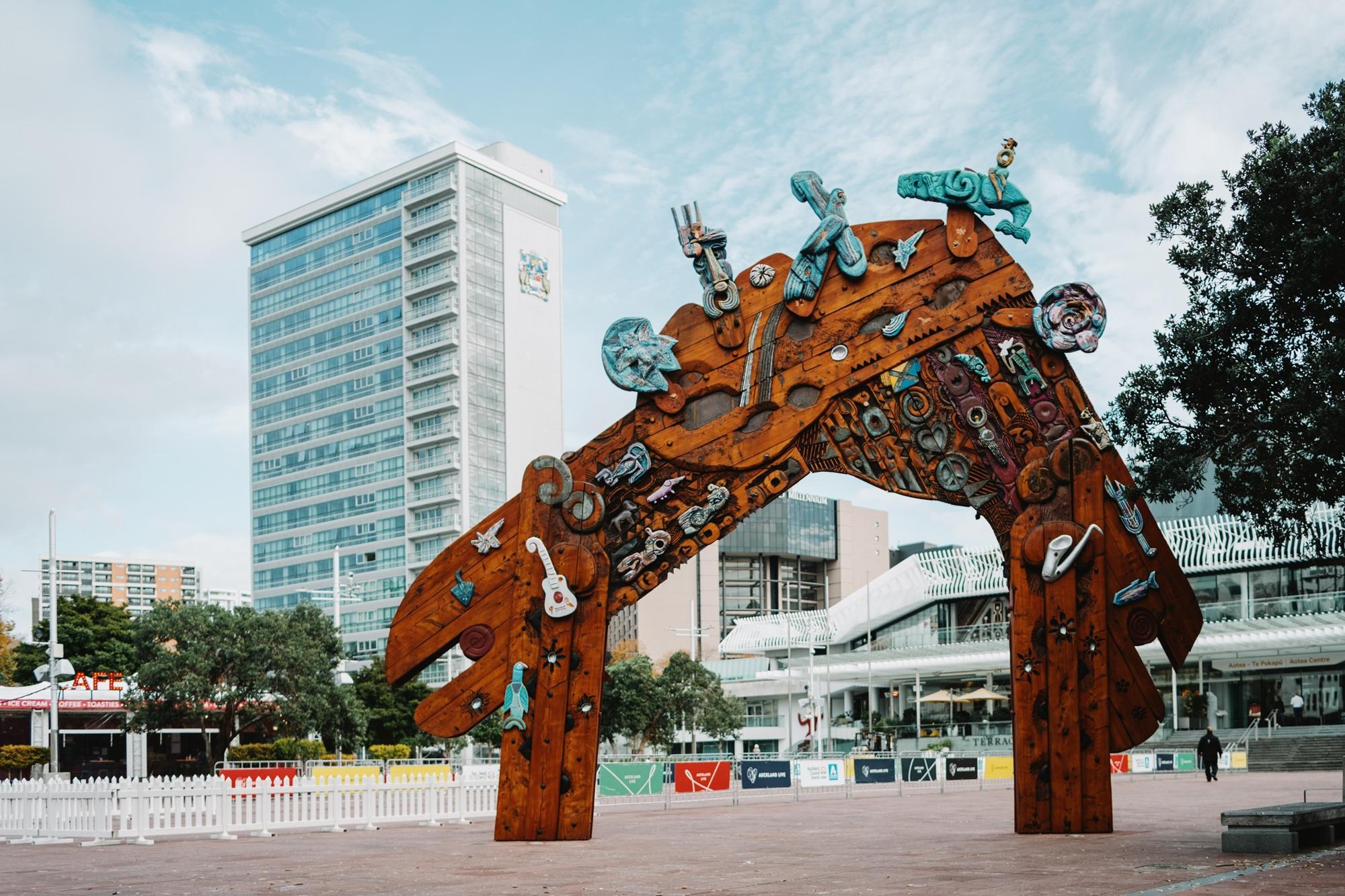 Large carved and painted wooden waharoa (gateway) in Aotea Square