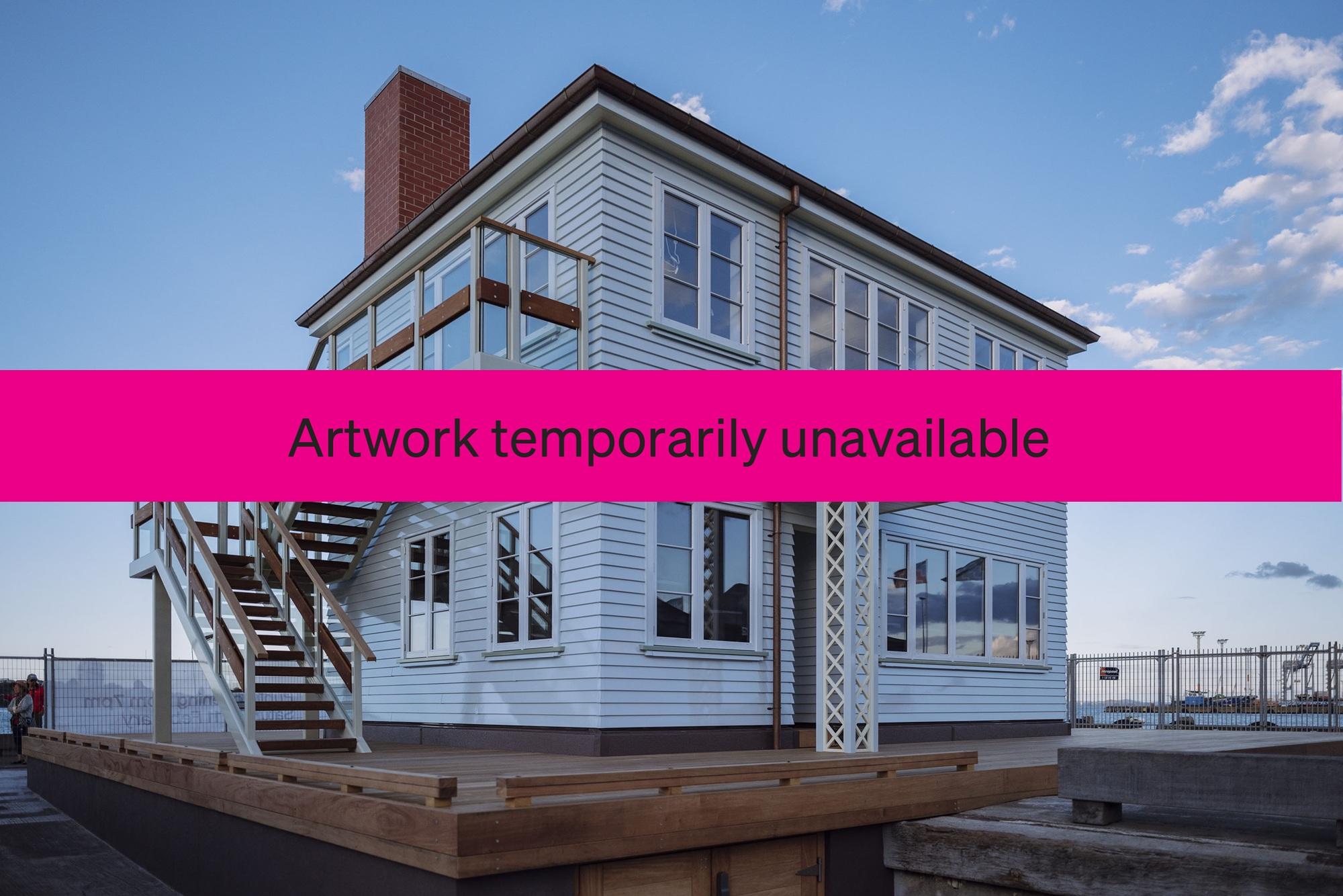 A white two storey state house on a wharf with a pink unavailable banner across the image